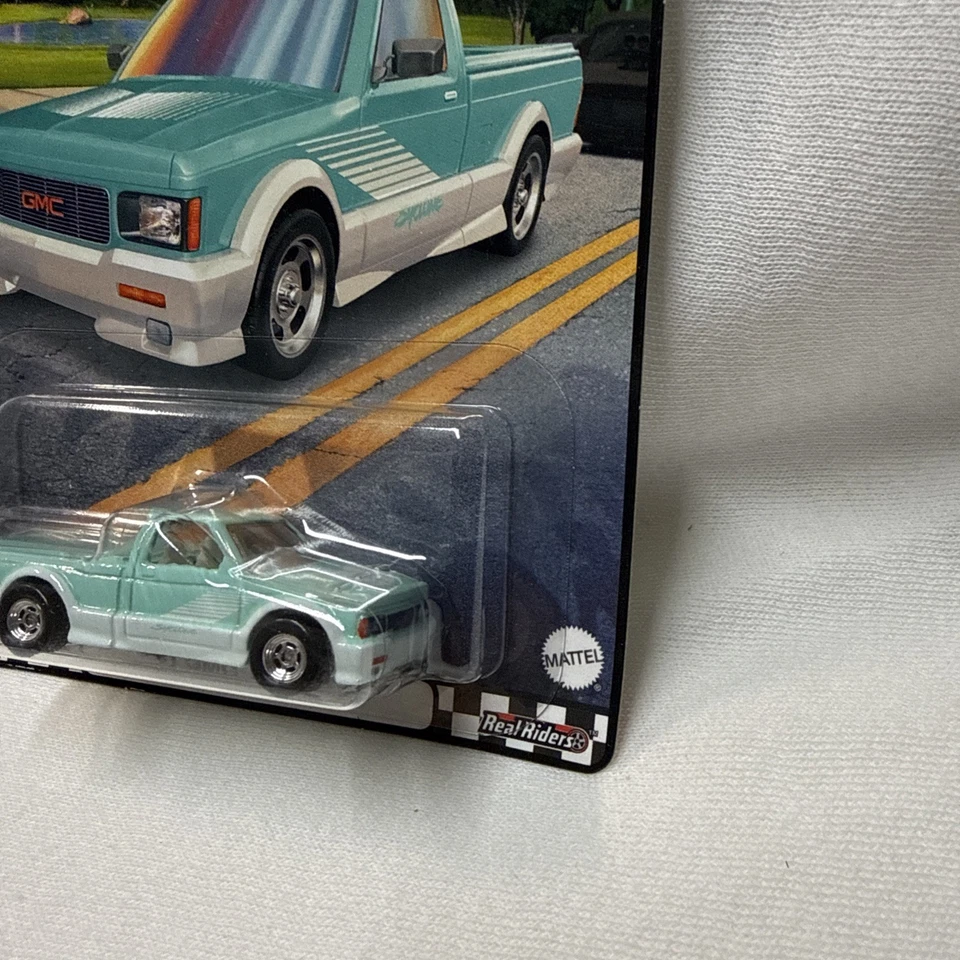 🔥 GMC Syclone Hot Wheels Premium Boulevard #80 '91 - pilotos reales Foto 3 de 4
