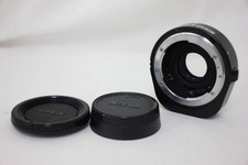 Nikon AF Teleconverter TC-16A 1.6x with front and rear caps, teleconverter