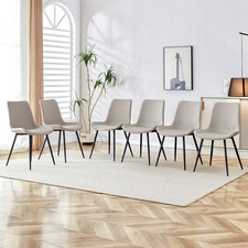 Light gray artificial leather backrest cushion dining chair, black metal legs,