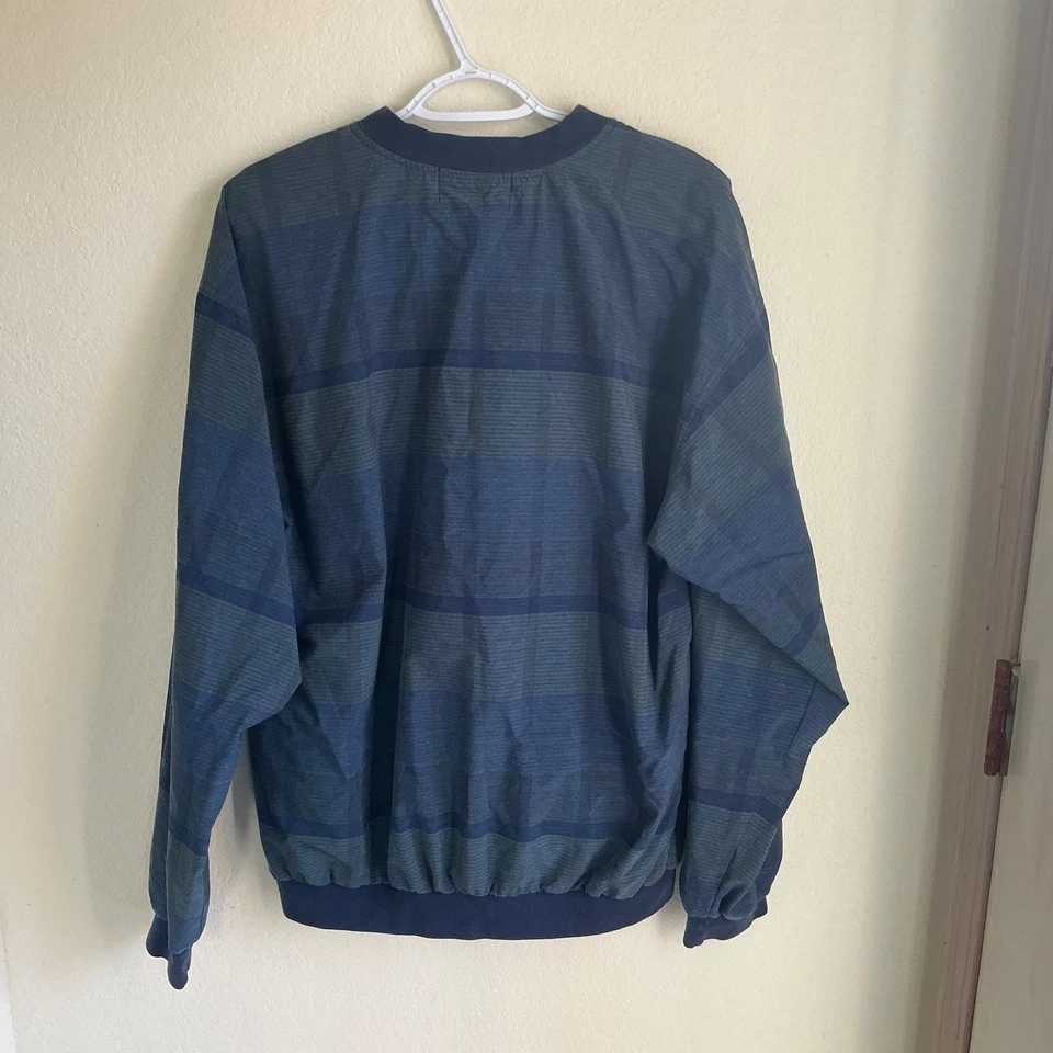 Pullover cortavientos de golf Kansas Jayhawks para hombre pequeños elementos azul y gris de colección Foto 2 de 4