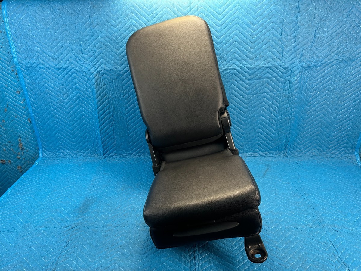 OEM RAM 1500 Front Center Console Jump Seat w/ Armrest Black:VLX9