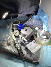 Lot of assorted unknown machine parts from a closing machine shop Assortment AAA