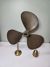 ANTIQUE FEDERAL EQUI-POISE BRASS PROPELLER. 16 LH 18. W/ CUSTOM DISPLAY FIXTURE.