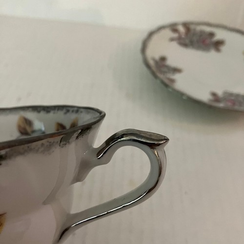 Taza de té y platillo de porcelana Fred Roberts Co. Silver Roses - Imagen 11 de 11