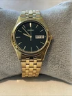 Vintage Seiko 7N43-9048 Gold Watch Day / Date Black Dial New Battery Runs 7.5"