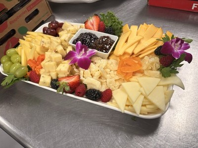 Assorted Cheese Platter with Grapes, Strawberries, Blackberries, and Garnishes