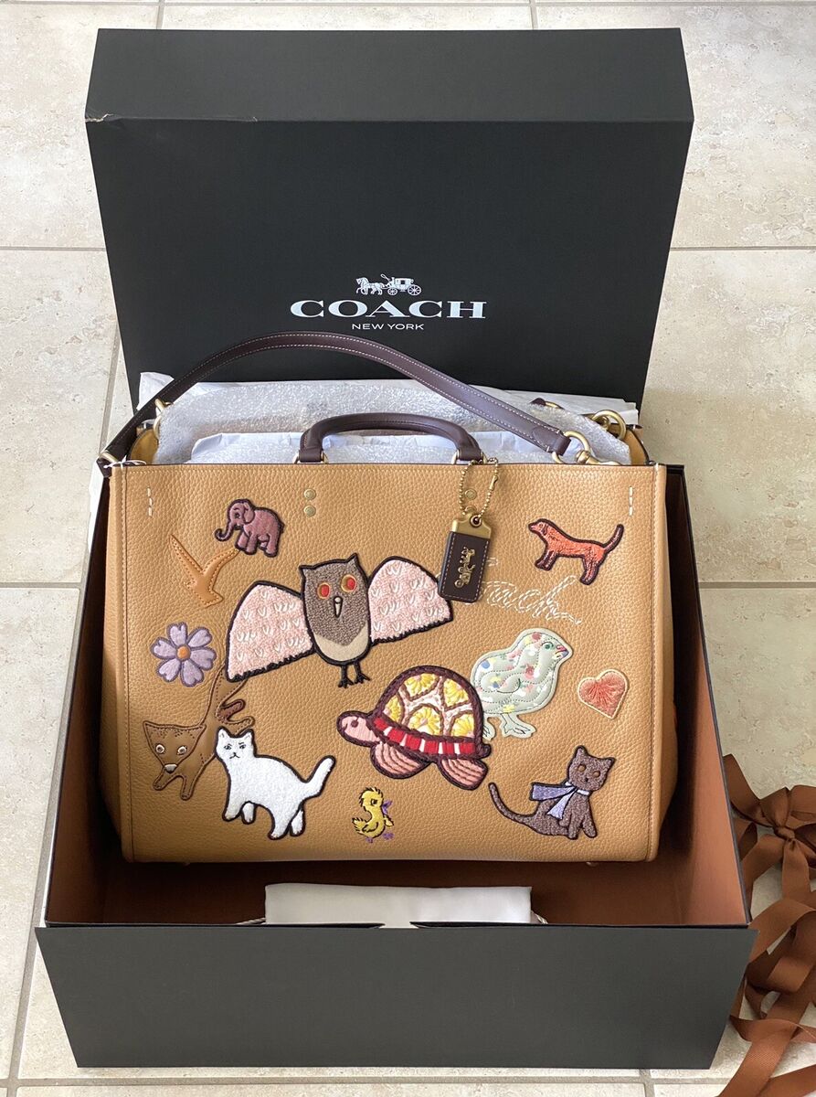 NWT COACH LIGHT TAN/MULTI XL ROGUE 39 WITH ANIMAL CREATURE NWT COACH LIGHT TAN/MULTI XL ROGUE 39 WITH ANIMAL CREATURE