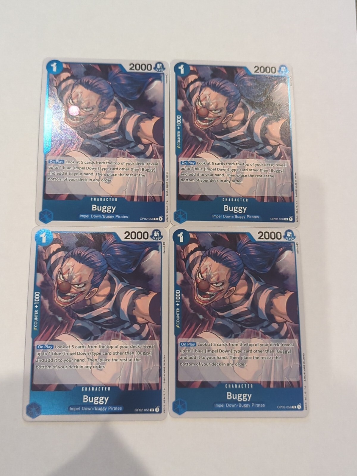 One Piece Card Game Buggy OP02-058 Rare - Blue - Playset - Near Mint