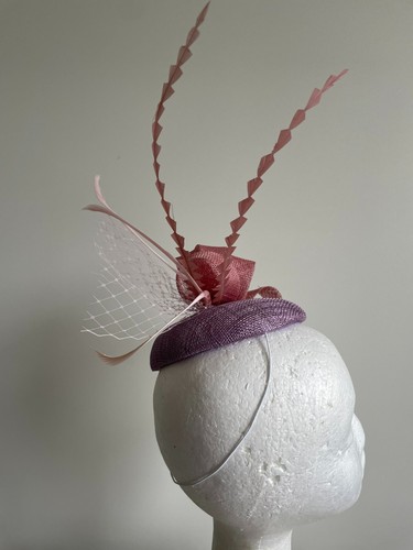 Lilac fascinator with round base and pink loops, netting and feathers - Picture 2 of 5