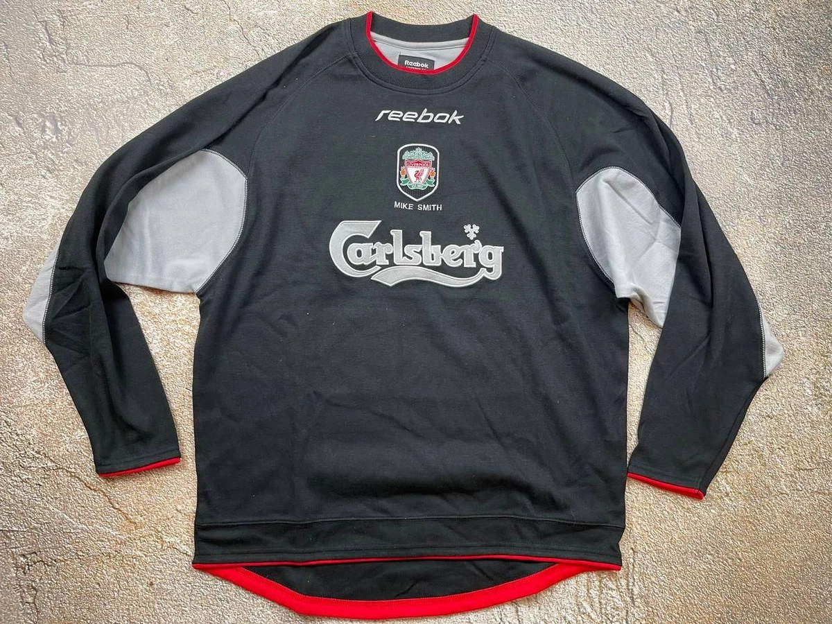 Preços baixos em Reebok Liverpool Preto Clube Internacional de