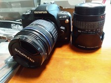 OLYMPUS E-410 Digital DSLR Camera With Telephoto Lens And Other Accessories.