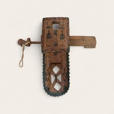 Handcrafted Wooden Lock with Intricate Carvings