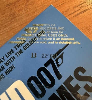 James Bond 007 - 13 Original Themes - Vinyl 1983 PROMOTIONAL  ONLY COPY SHRINK