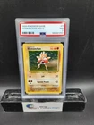 1999 POKEMON GAME HITMONCHAN-HOLO BASE SET UNLIMITED 7/102 PSA 7 NM