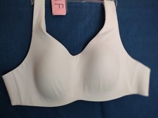 ATHLETA Bra.size 36C. WHITE LIGHTLY PADDED WIRELESS CONVERTIBLE STRAPS BRA