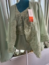 Woman  s sophisticated, eloquent, three-piece pant suit mother of the bride
