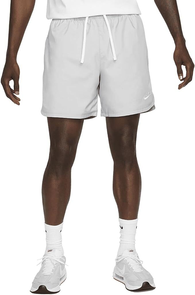 Мужские тканые шорты Nike Sportswear Essentials Flow Shorts светло-дымчато-серые DM6829-077 7990₽