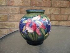 MOORCROFT  ORCHID ON GREEN PATTERN BALL SHAPE VASE . WALTER MOORCROFT