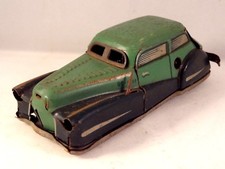 Ancien jouet voiture tôle lithographiée mécanique Joustra auto 2003 années 50