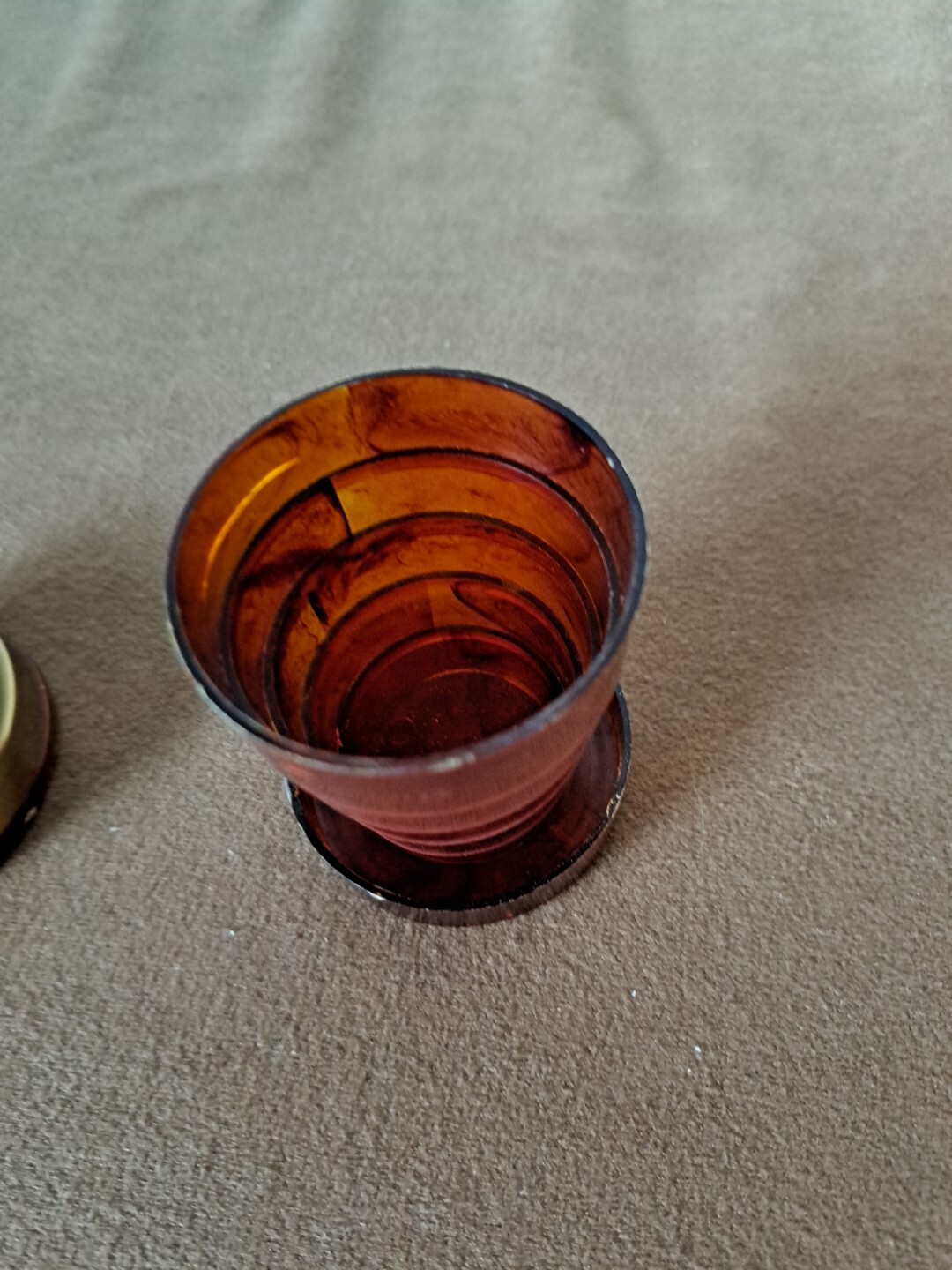 The vintage celebrity drinking cup and pill box is a unique collectible