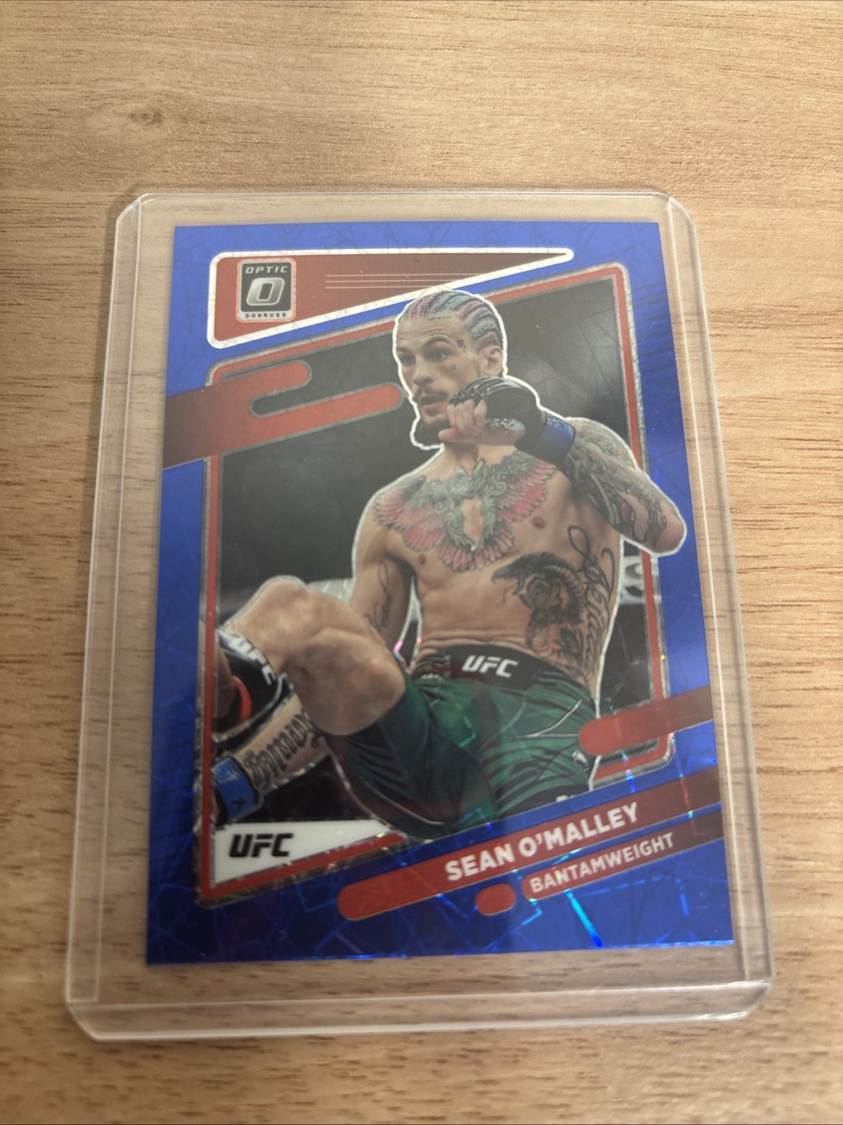 2022 Panini Donruss Optic UFC - Sean O'Malley #9 Blue Velocity Prizm