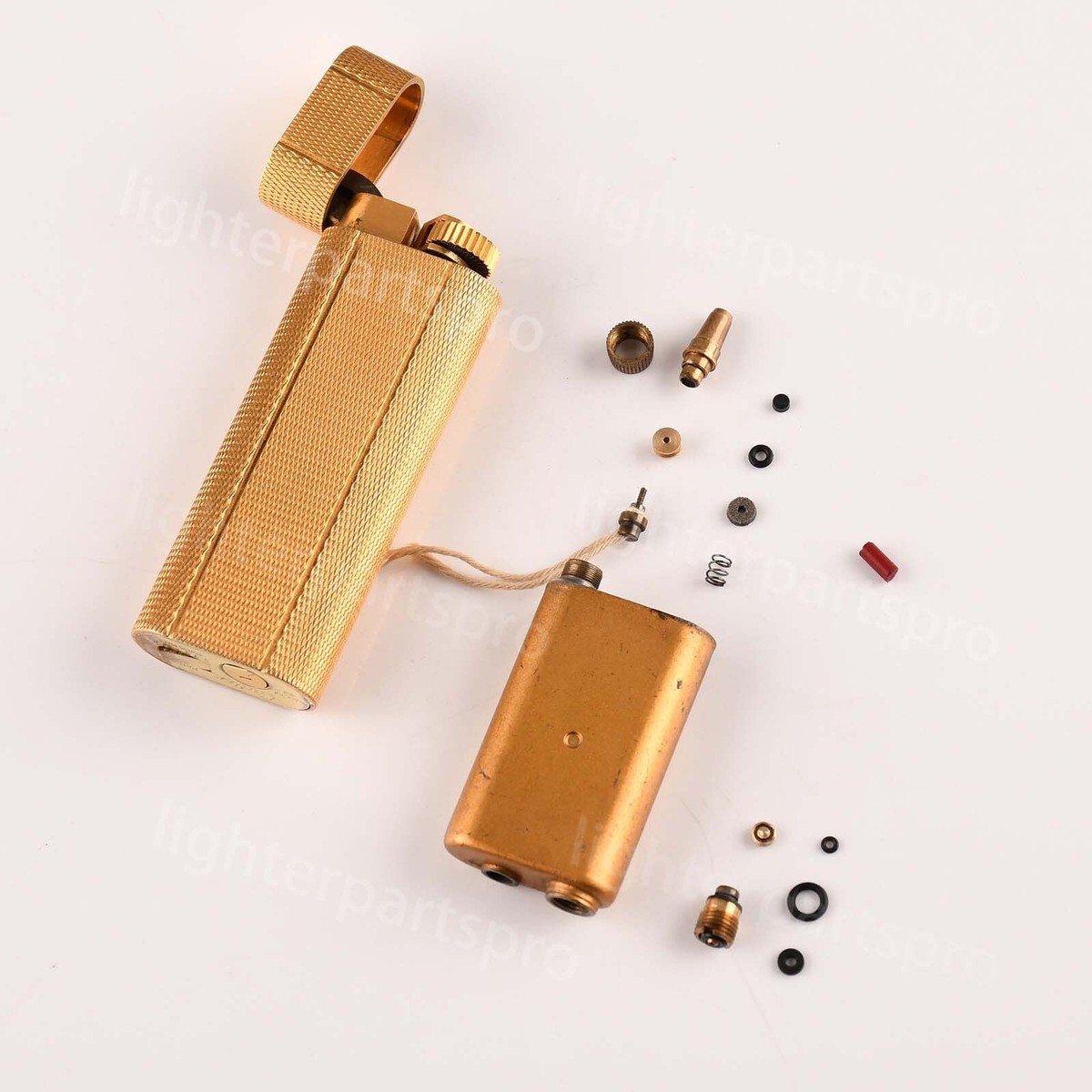 Cartier レザー 円形ミラー オレンジ Original Vintage Cartier Lighter, Gold-plated With a Trinity