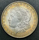 1884 O Morgan 90% Silver Dollar New Orleans Mint Light Rainbow Toning EXCEL
