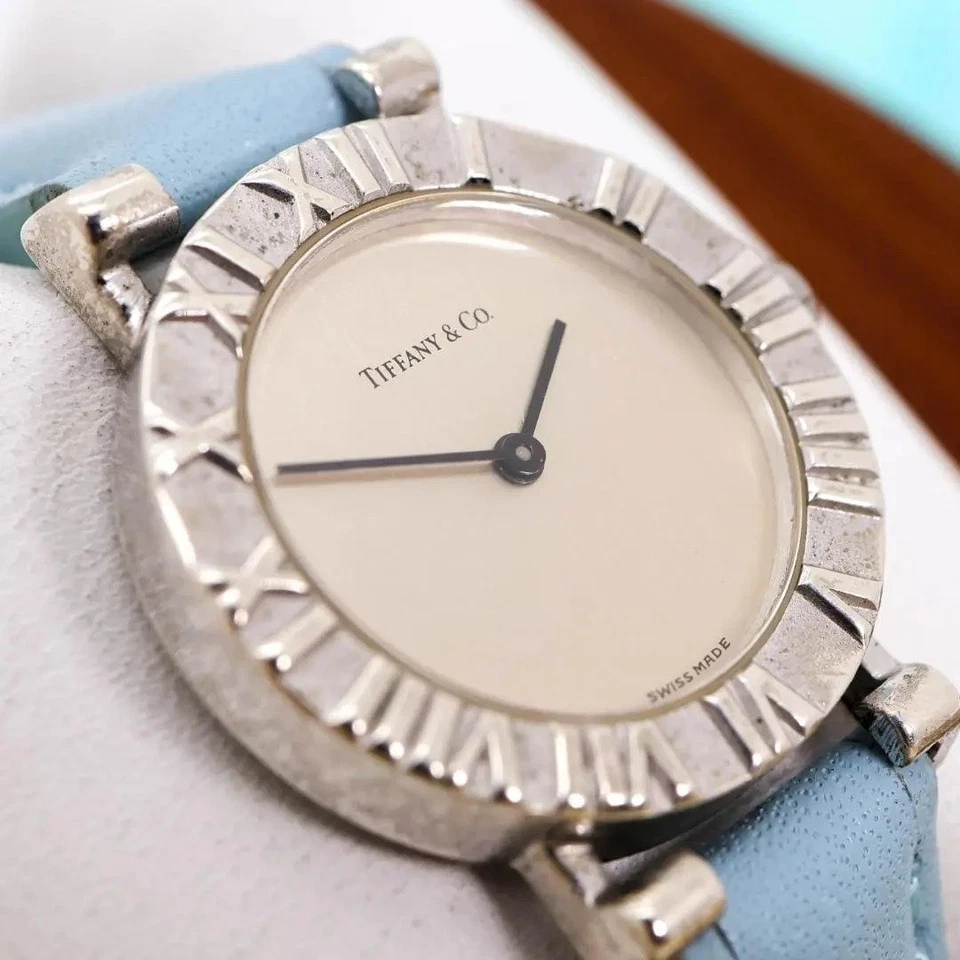 Reloj de cuarzo Tiffany & Co Atlas plateado usado, batería cambiada, auténtico Foto 2 de 4