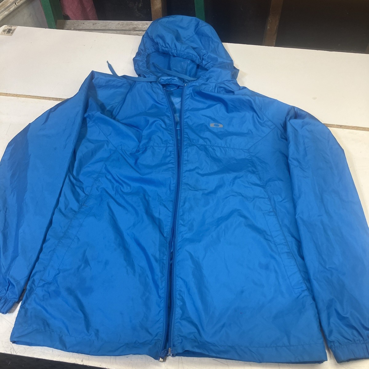 Oakley RN # 96548 CA # 35460 Hooded Zip Jacket Blue Size M