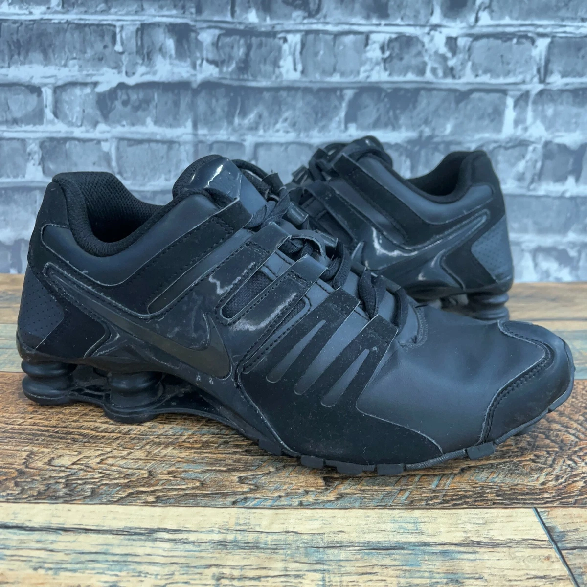 Womens black nike shox clearance sale