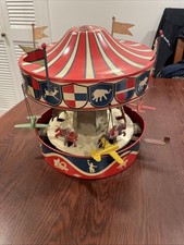 VINTAGE WOLVERINE CLOCKWORK/WIND UP MERRY-GO-ROUND Model 31a