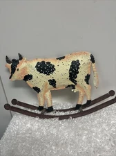 FOLK ART SHEET METAL ROCKING COW