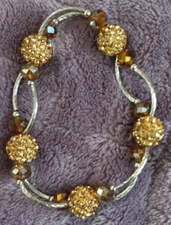 Silver Tone And Yellow Beaded Streatchy Bracelet