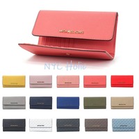 Click here for more details on New Michael Kors Large Trifold...