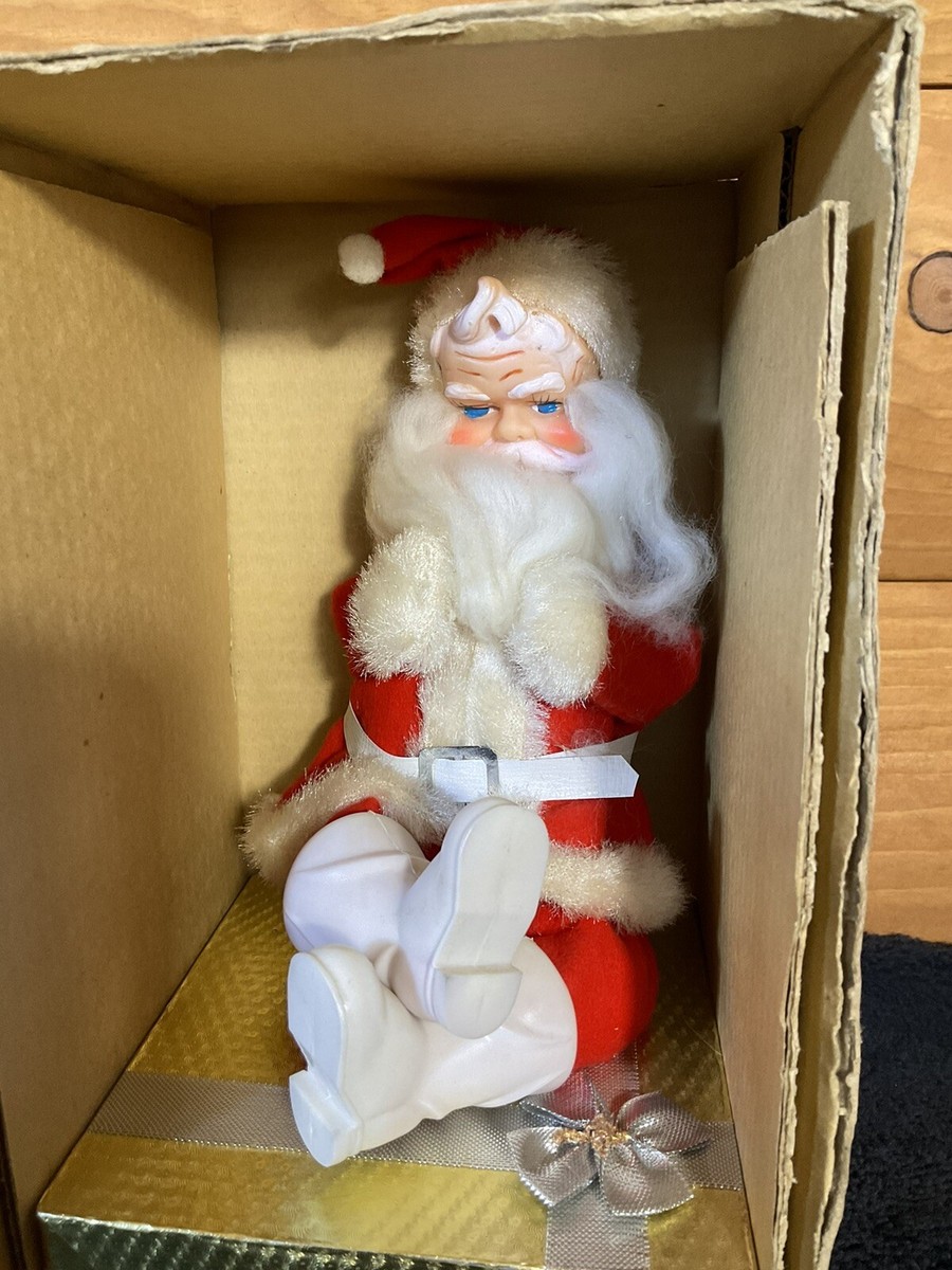 Vintage Kitschy grumpy Santa Claus sitting on present Japan 1950sn