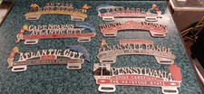 Lot Of 7 Different License Plate Cast Aluminum Toppers Lot Of 7 Different License Plate Cast Aluminum Toppers