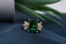 1.50Ct Emerald Cut Lab Created Green Emerald Womens Ring 14K Yellow Gold Plated