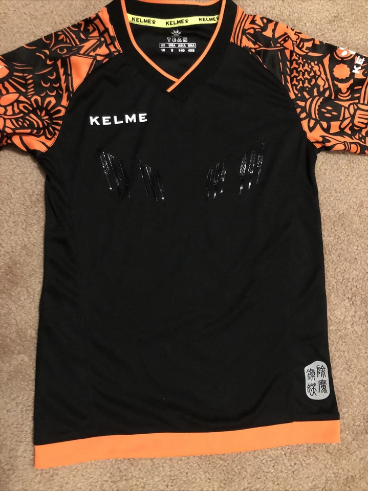 Camisa Jersey Juvenil Talla 8 Team Kelme Codos Acolchados Naranja/Negro Foto 2 de 3