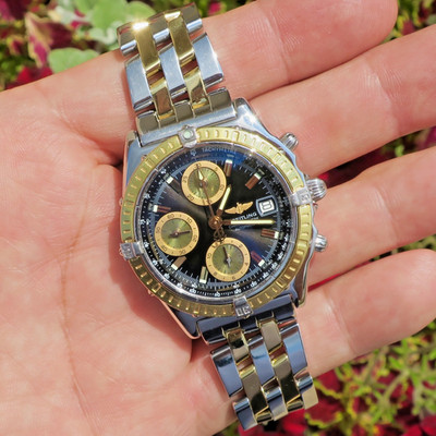 Breitling Chronomat D13352 Black Dial 18k Yellow Gold and Stainless on Bracelet