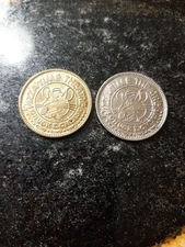 Two 1981 Chuck-E-Cheese Error Tokens Brass & Nickel with Die Breaks