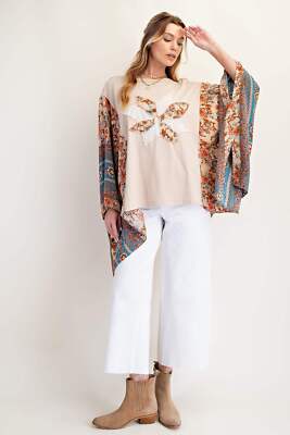 Easel brand embroidered mixed print poncho. RUNS OVERSIZED. SIZE DOWN