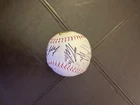 an autographed party animal baseball
