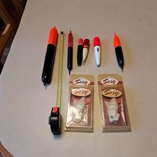 Six pike floats and two Sosy Lures