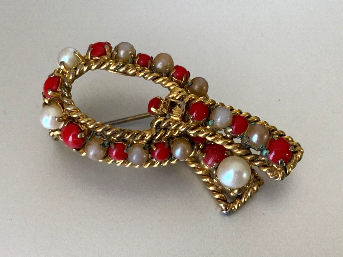 Christian dior hotsell brooch vintage