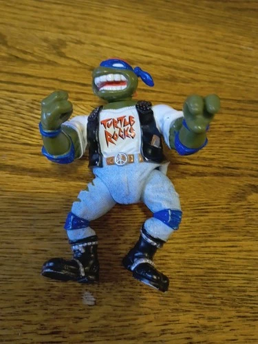 VINTAGE TMNT FIGURE ROCKIN LEO TURTLE PLAYMATES 1991