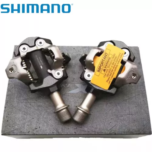 Pedali e tacchetti bici Shimano Deore XT PD-M8100 Cross Country Race SPD MTB XC - Foto 2 di 6