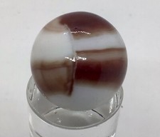 vintage Marble King white base ribbon marble. .94 , in near mint dug condition.