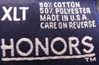 White VTG Honors XLT men’s gray pocket tee with black thread, front pocket, and “50% cotton 50% polyester made in U.S.A.” label.