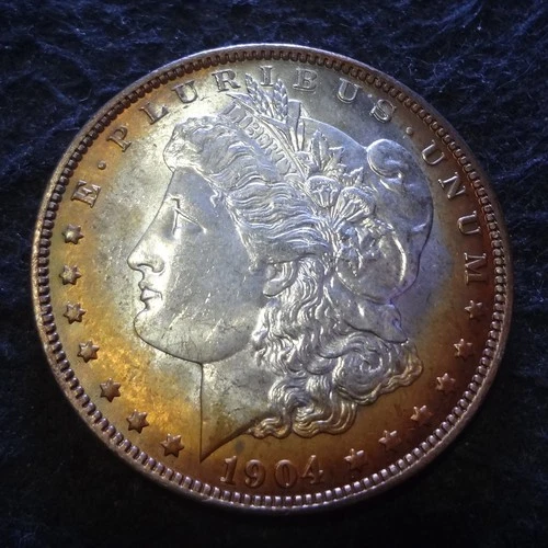 1904-O Morgan Silver Dollar - Toned Choice AU+ details from the New Orleans mint