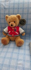 F.A.O Schwarz new very soft brown teddy bear with red snap close jacket NWT'S
